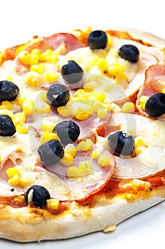 pizza with ham, corn and olives