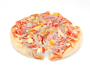 Pizza with ham and corn seed on top