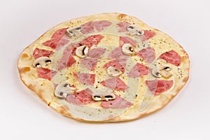 Pizza with ham, mushrooms and cheese on a white background.