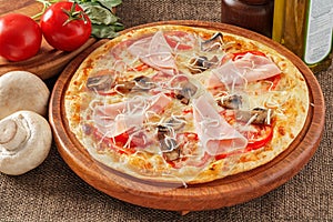 Pizza with ham and mushrooms