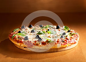 Pizza with ham and olives
