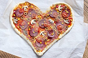 Pizza heart shaped with pepperoni