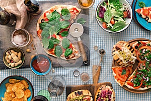 Pizza, hot dog, salad, wine, beer and snacks for beer