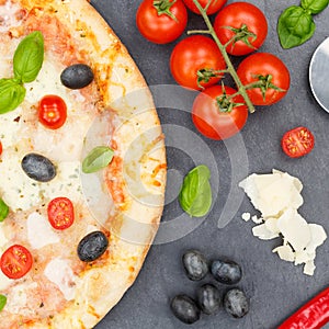 Pizza margarita margherita from above square baking ingredients close up slate