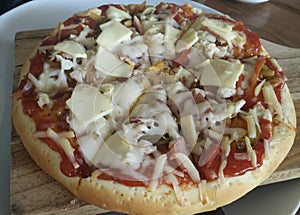 Pizza mozarella cheesse with tomato mushroom