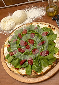 Pizza  rucula and dried tomato