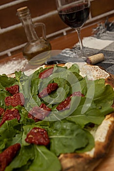 Pizza  rucula and dried tomato