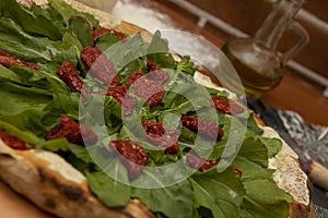 Pizza  rucula and dried tomato