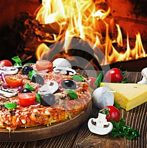 Pizza with mushrooms and cheese served on wooden table