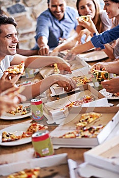 Pizza, party and group of people eating fast food, lunch and meal in celebration together at restaurant, home or cafe