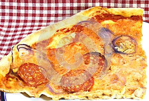 pizza with pepperoni and onion tuna