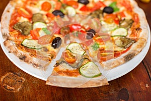 Pizza with peppers, olives and cheese