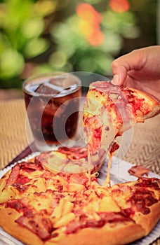 Pizza picture with a glass of sparkling water. Blurred background