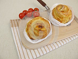 Pizza pinwheel with tomatoes and cheese