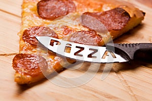 Pizza with a pizza-knife