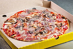 Pizza prosciutto crudo packaged photo