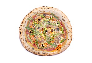 Pizza with prosciutto and spices on white background, copy space, top view. Flatbread pizza garnished with fresh arugula