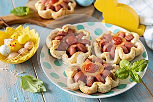 Pizza in puff pastry with cheese and tomatoes