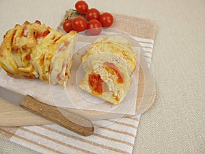 Pizza pull-apart bread with tomatoes and cheese