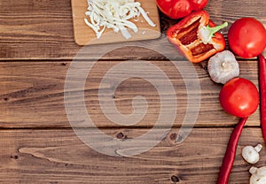 Pizza and red wine on wooden table background. Top view with copy space