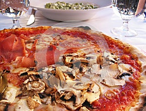 Pizza at roadside cafe in rome