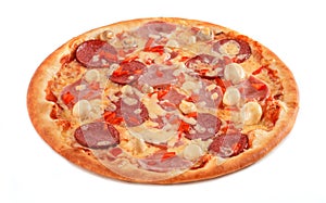 Pizza with salami, pastrami, ham, mushrooms and pepper isolated