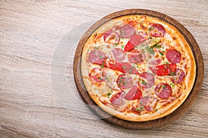 pizza with salami and red pepper