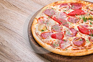 pizza with salami and red pepper