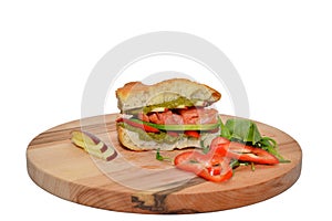 Pizza sandwich served on wooden plate