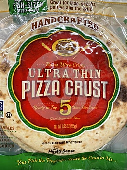 Pizza sauce kits on a retail store shelf Ultra thin crust
