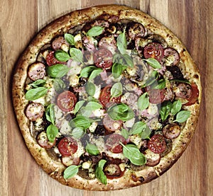 Pizza with Sausages and Tomatoes