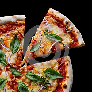 The pizza showcases a generous amount of gooey, golden cheese on a black background photo