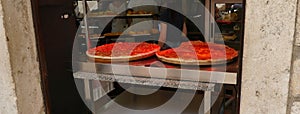 Pizza by the slice at small shop in  Kotor photo