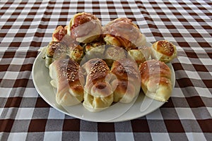 Pizza slugs rolls and buns on a plate