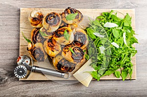 Pizza snails, minipizza with salad and parmagio