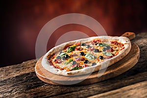 Pizza. Tasty fresh italian pizza served on old wooden table