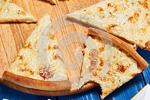 Pizza with three cheeses.