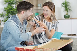 pizza time fast food man and woman eating pizza