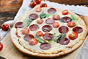 Tasty Pizza With Tomato Sauce, Pepperoni Sausage, And Mushrooms On Wooden Background Natural Rustic, A Pizza Cutter And Ingridient