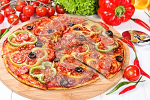 Pizza with tomatoes, peppers and olives