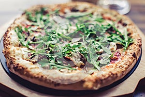 Pizza vegetable on wooden plate
