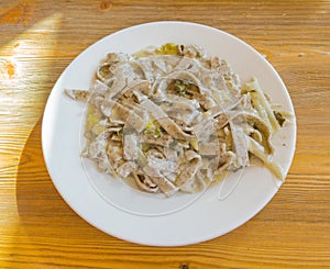 Pizzoccheri are a traditional Italian dish from the Valtellina area. Dish prepared with pasta similar to tagliatelle