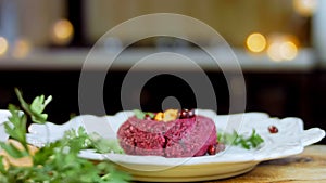 Pkhali traditional Georgian food. Beetroot is used for the purple color. Walnut is used for decoration