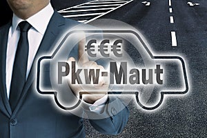 PKW-Maut in german toll car touchscreen man operated concept