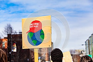 Placard by ecological protestor at rally