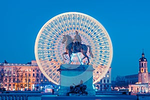 Place Bellecour, famous statue of King Louis XIV by night