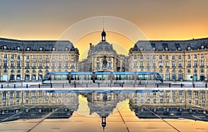 Place de la Bourse reflecting from the water mirror in Bordeaux, France photo