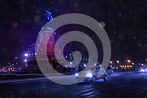 Place de la Republique and car on road under snow