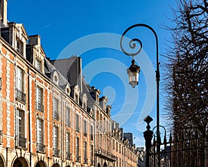 Place des Vosges on a clear winter day, Paris, France