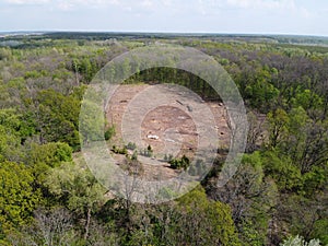 A place of felling, aerial view. Devastated land, clearing
